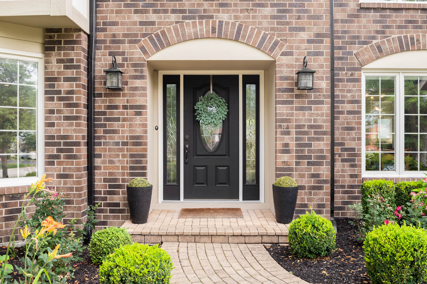 The front door of a home in a residential area - Hello Pest Control offers expert roach exterminator services in Westchester County, NY.